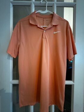 Nike Men’s Coral-Orange Polo with Swoosh